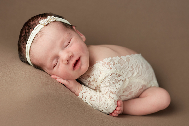 Beautiful Newborn on Taupe with Lace Outfit and Headband for girl in Eden Prairie, MN